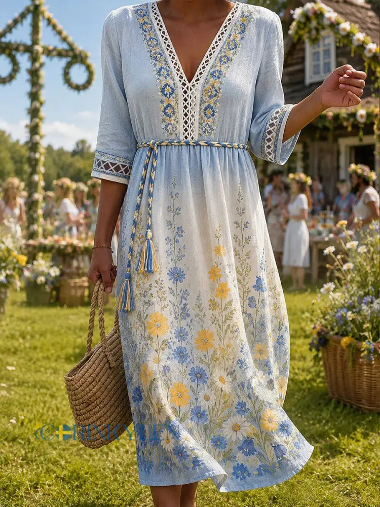 Damklänning med midsommarblommönster v-ringning och lång ärm - A / S