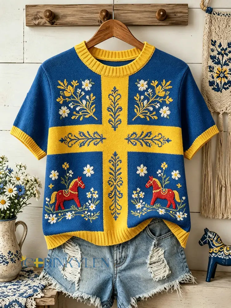 Dammens midsommartröja i stickat tyg med blommönster och korta ärmar - A / S