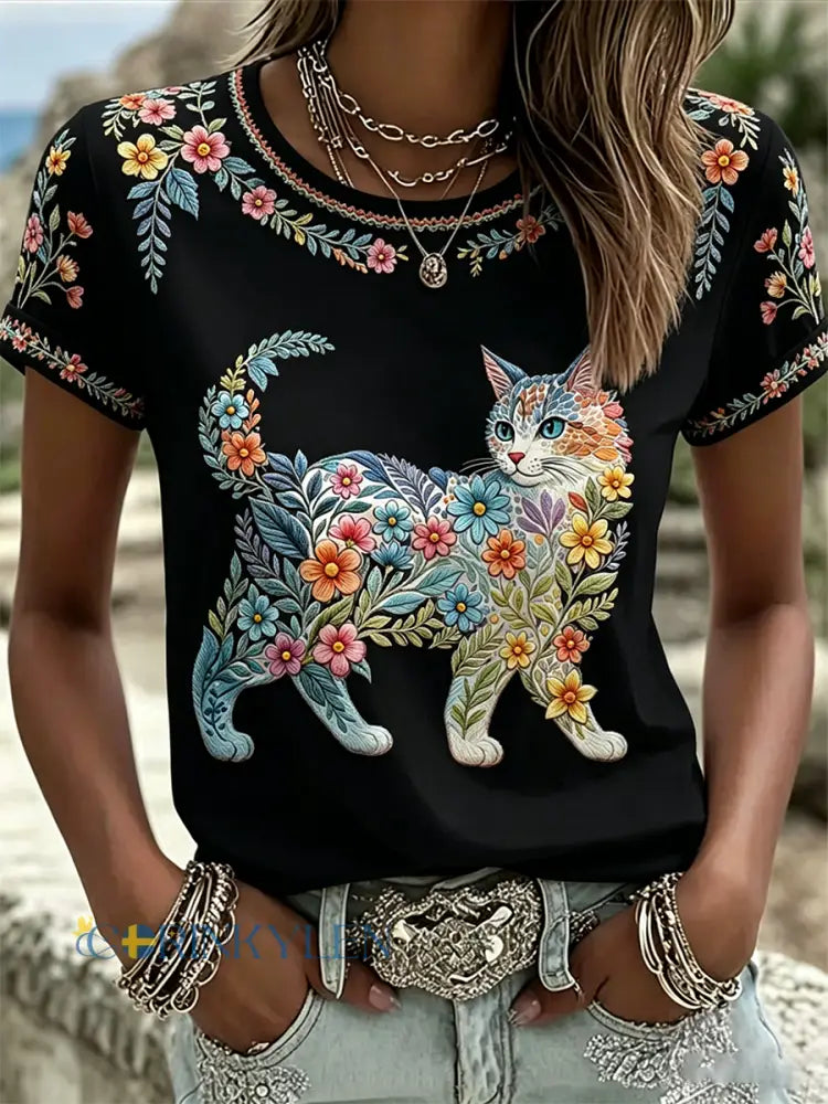 Dams örtblommig kattmönstrad casual t-shirt - svart / S