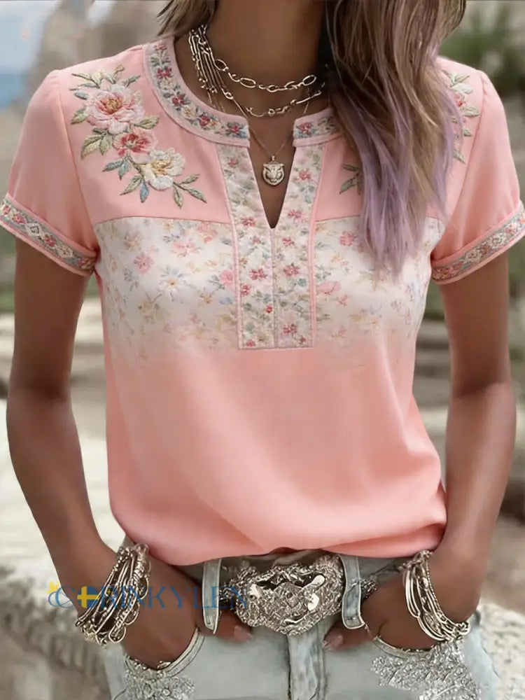 Dams rosa t-shirt med blommönster och korta ärmar - runk / S