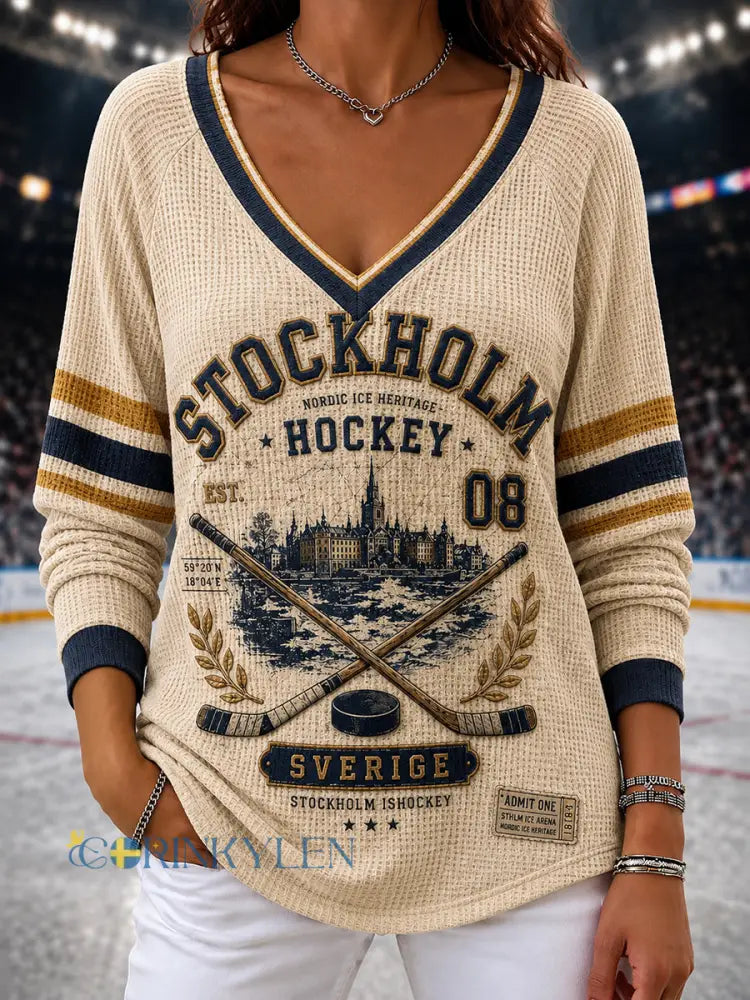 Damtröja i vintagestil från Stockholm Sverige med raglanärmar och ishockeymotiv - A / S
