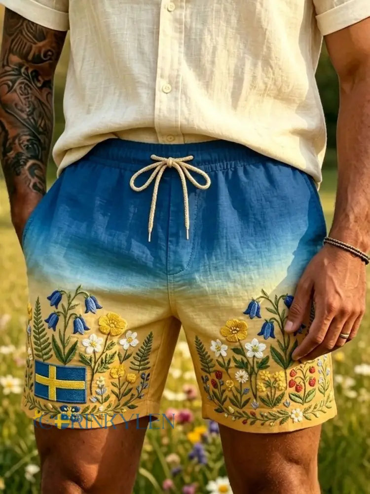 Herrers retro svenska nationaldags-/midsommarfolkloristiska korta byxor i bomull-linne med blommönster - blå / S