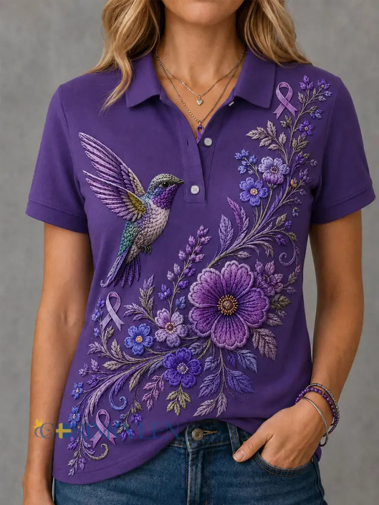 Kvinnors lila blommor & Hummingbird Skriv ut Alzheimers medvetenhet Support Polo. - mörkt / S