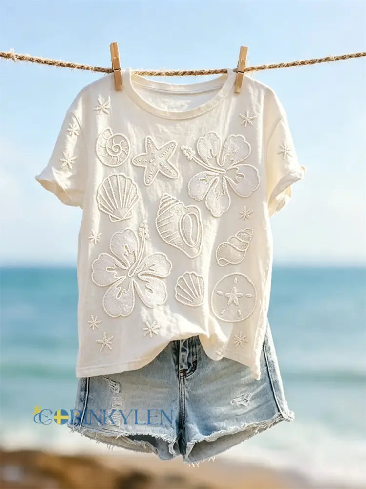 Kvinnors stjärna & Sea Shells Strand Blommor Skriv ut kortärmad T-shirt - vitt / S