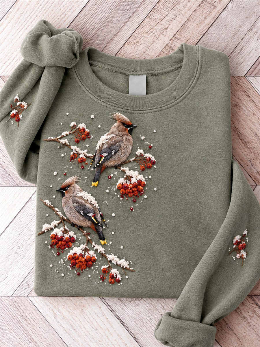 Kvinnors snöiga vintervaxning fåglar på Braches Print Sweatshirt