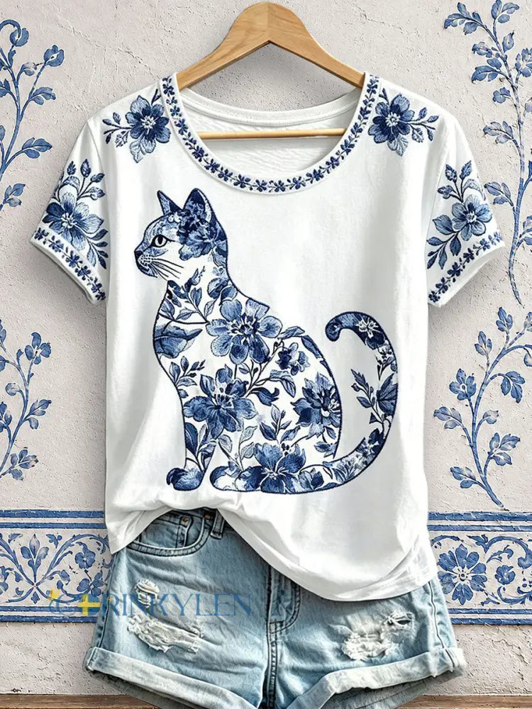 Dammens blommiga t-shirt med kattmönster - vitt / S