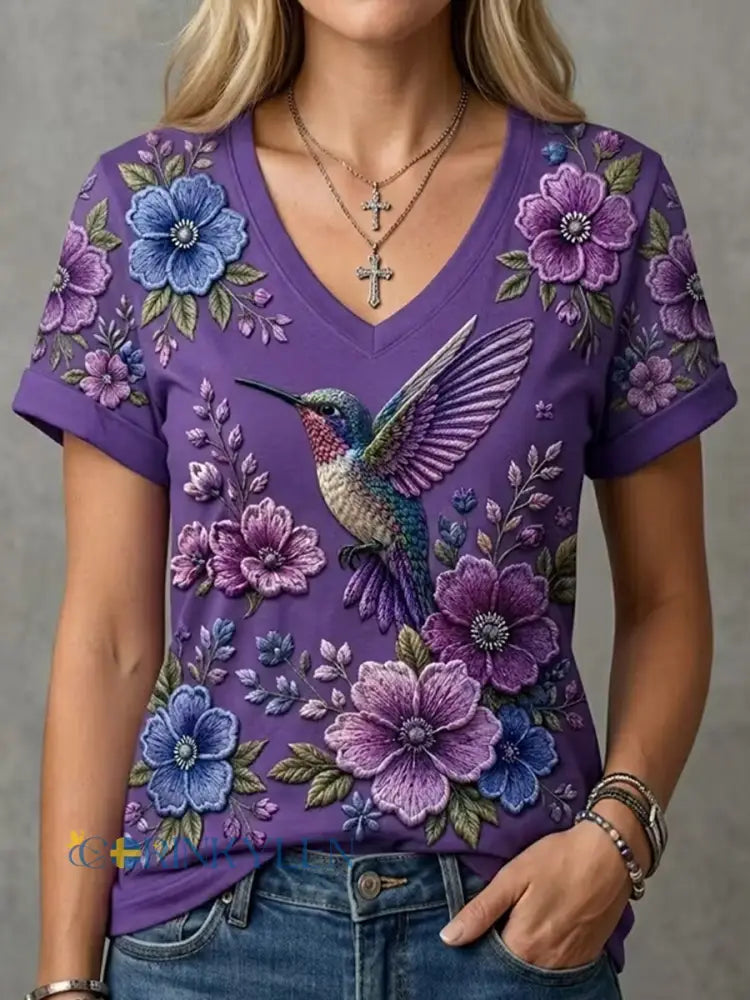 Dammens lila t-shirt med blommor och kolibri påtryck för medvetenhet om Alzheimers med V-ringning - mörkt / S