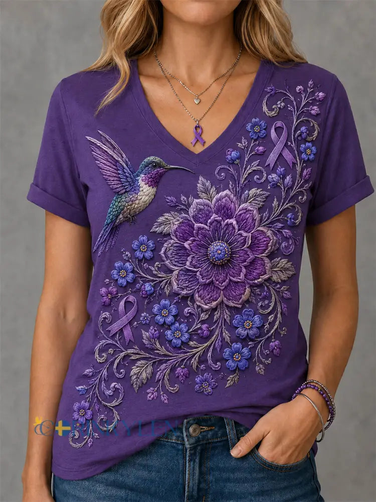 Dammens lila t-shirt med blommor och kolibri påtryck för medvetenhet om Alzheimers med V-ringning - mörkt / S