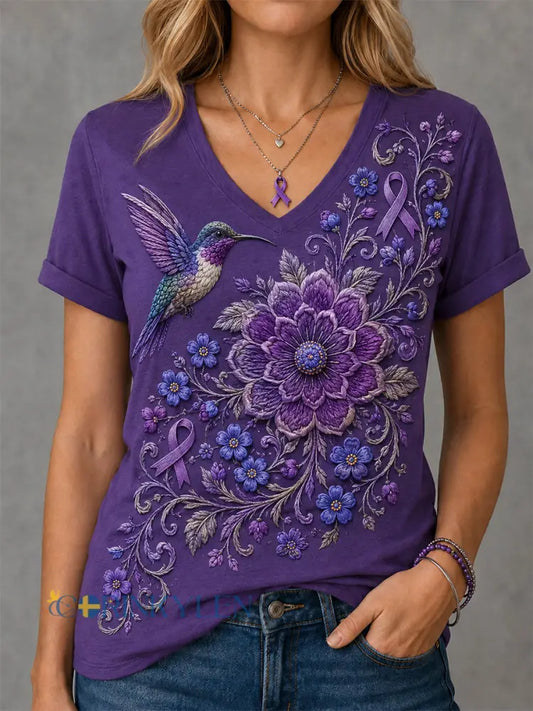 Dammens lila t-shirt med blommor och kolibri påtryck för medvetenhet om Alzheimers med V-ringning - mörkt / S