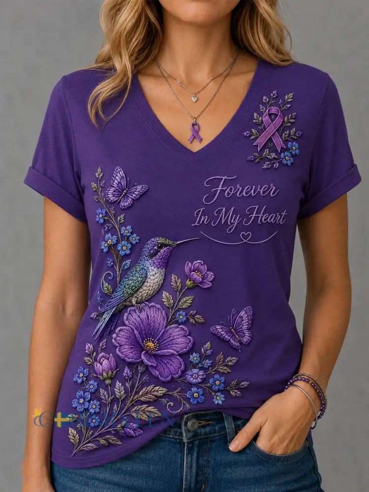 Dammens lila t-shirt med blommor och kolibri påtryck för medvetenhet om Alzheimers med V-ringning - mörkt / S