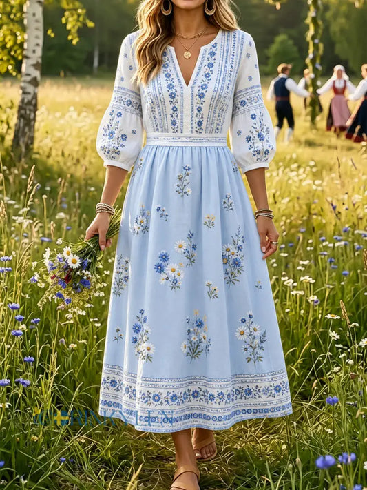 Dammens midsommarklänning med blommönster och v-ringning - A / S