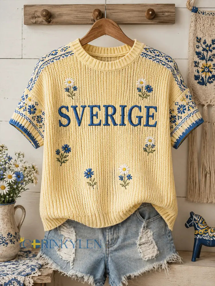 Dammens midsommartröja i stickat tyg med blommönster och korta ärmar - A / S