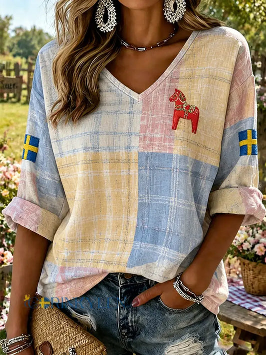 Dammens midsommartröja med blommönster och v-ringning - A / S