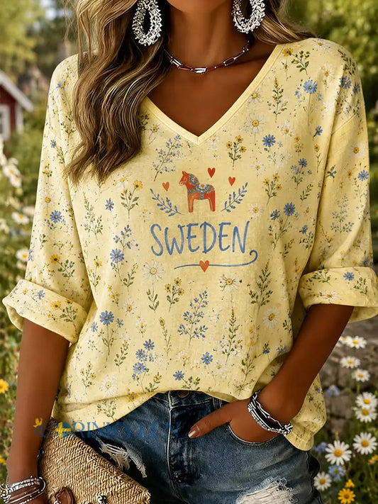 Dammens midsommartröja med blommönster och v-ringning - A / S