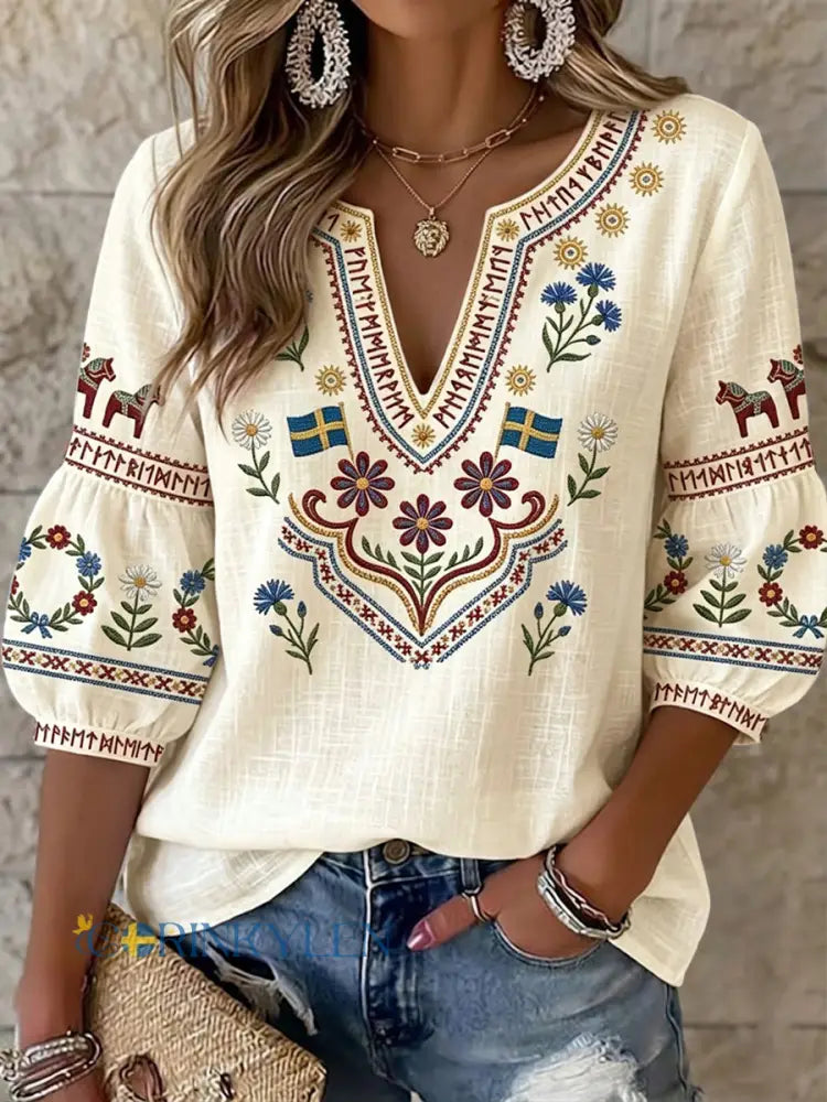 Dams blus i vintagestil från Sverige symmetriskt mönstrad med blommor och V-ringning - Aprikot / S