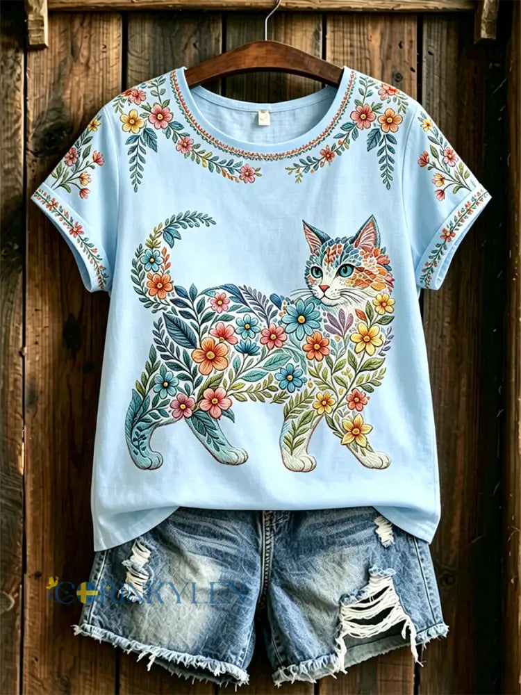Dams örtblommig kattmönstrad casual t-shirt - ljusblå / S