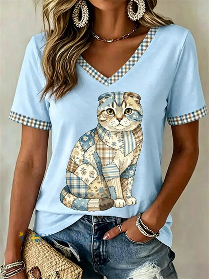 Dams örtblommig kattmönstrad casual t-shirt med V-ringning - ljusblå / S