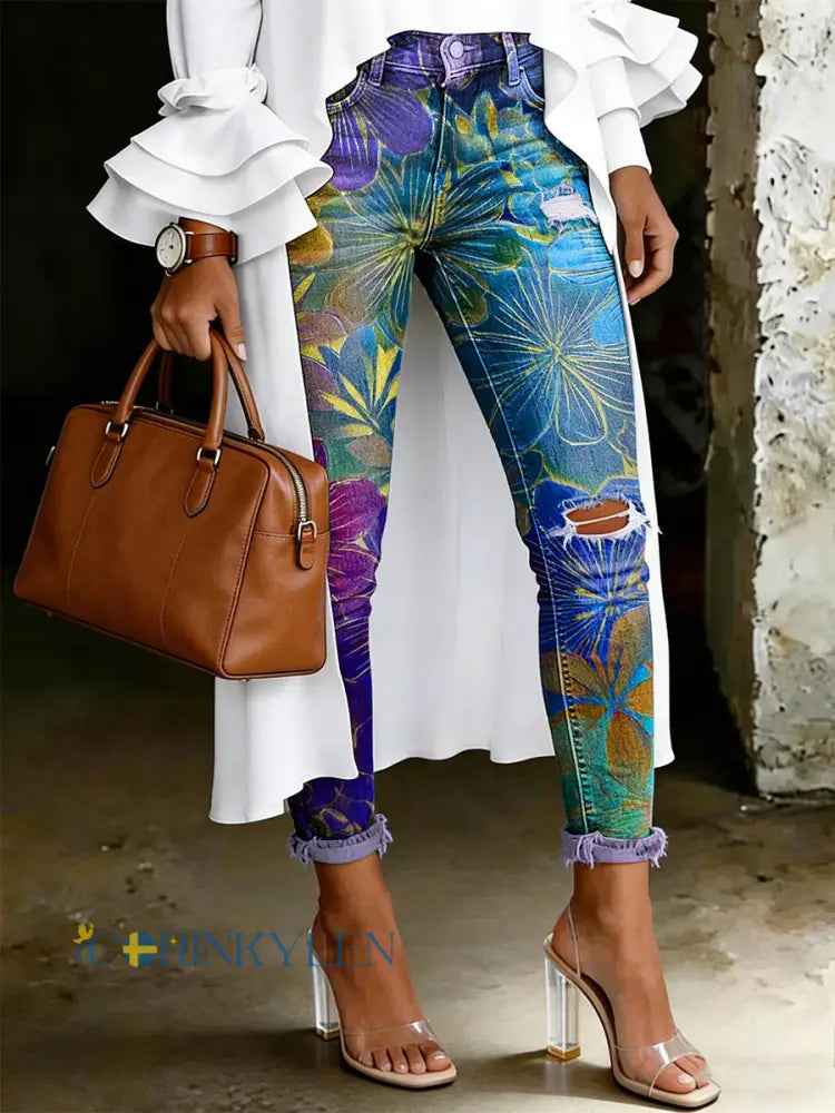 Damsjeans med artistisk blommönster - blå / S