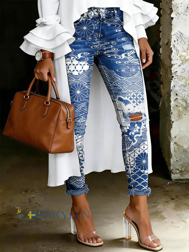 Damsjeans med artistisk blommönster - blå / S