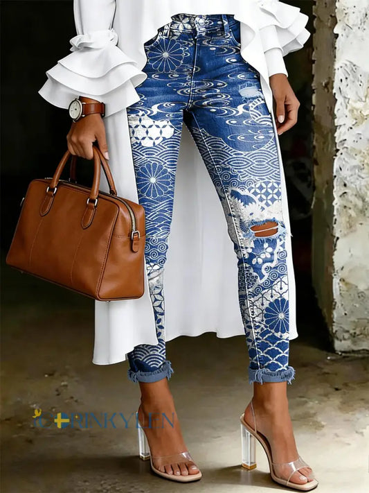 Damsjeans med artistisk blommönster - blå / S