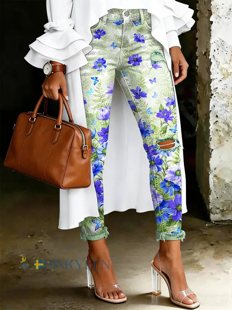 Damsjeans med artistisk blommönster - ljusgrön / S
