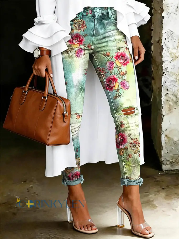 Damsjeans med artistisk blommönster - ljusgrön / S
