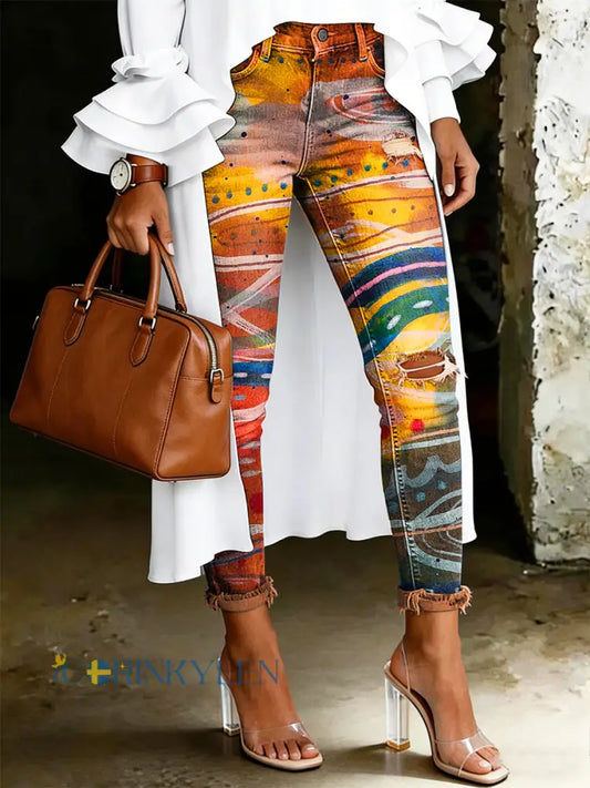 Damsjeans med artistisk blommönster - oräng / S