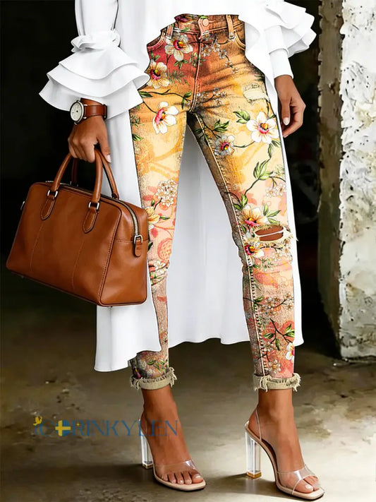 Damsjeans med artistisk blommönster - oräng / S