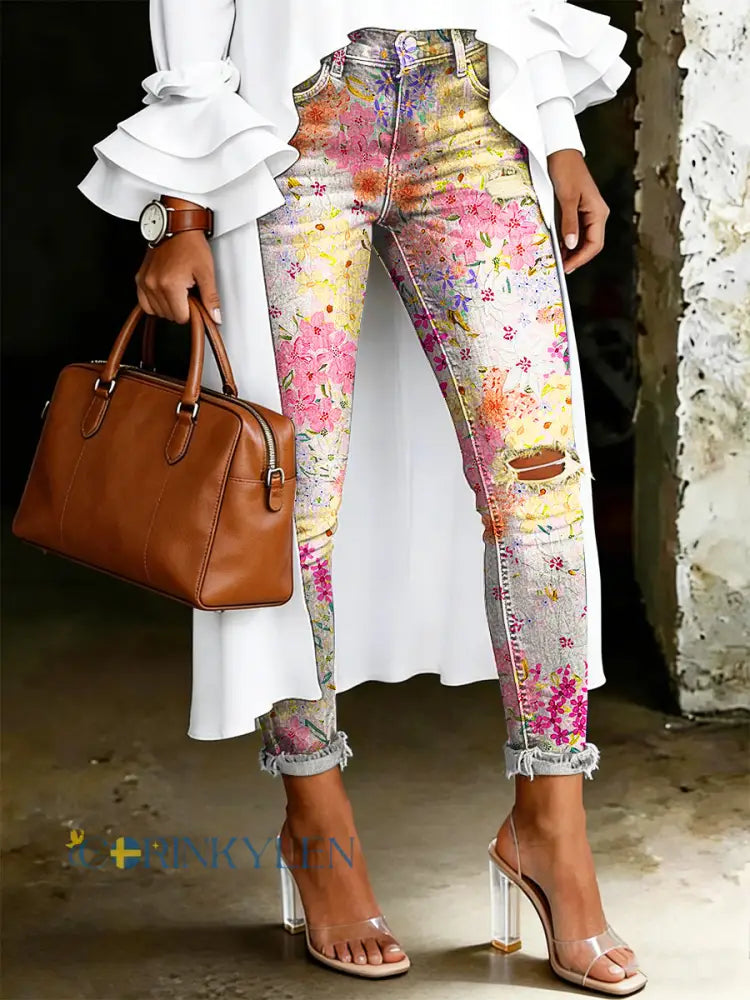 Damsjeans med artistisk blommönster - runk / S