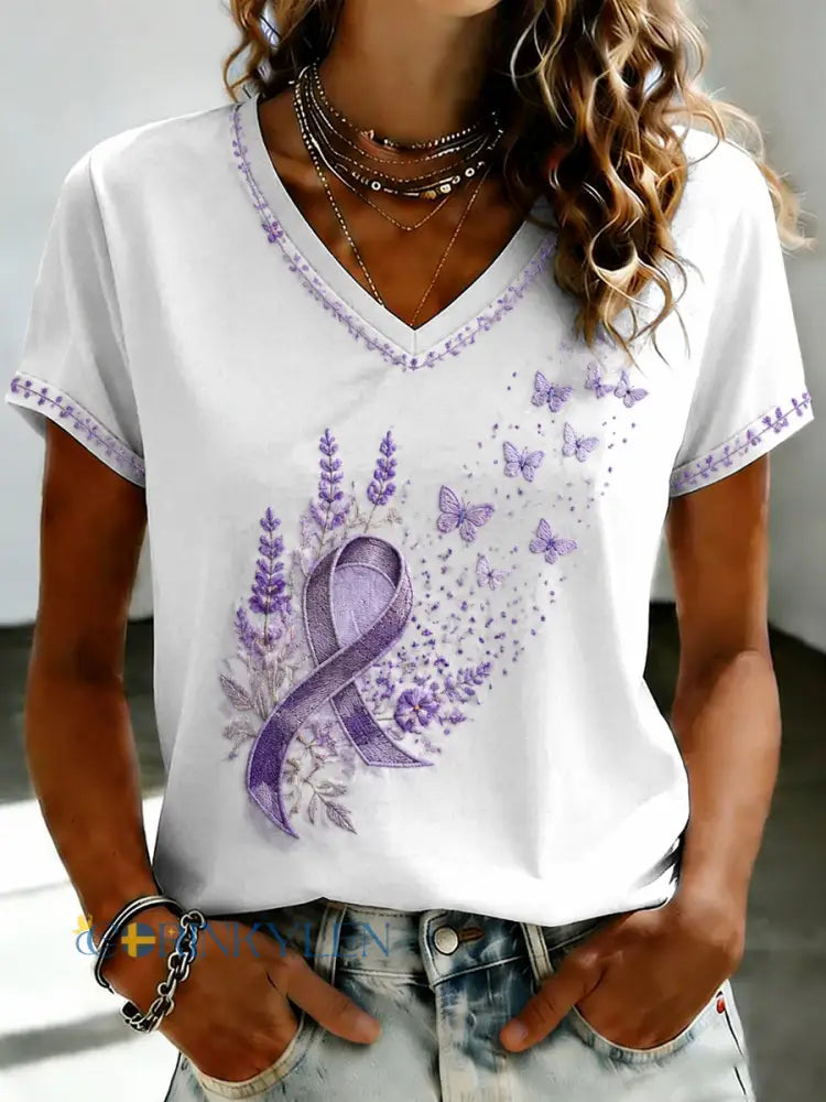 Damsvart Flora-konsttryckt t-shirt med v-ringning - vita / S