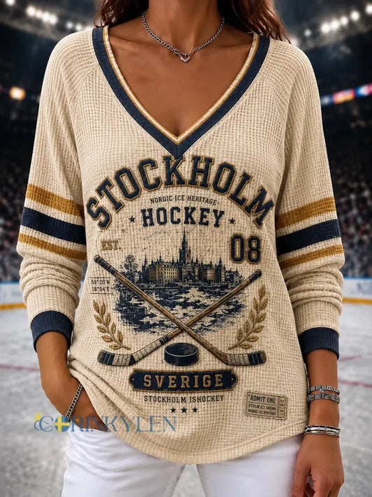 Damtröja i vintagestil från Stockholm Sverige med raglanärmar och ishockeymotiv - A / S