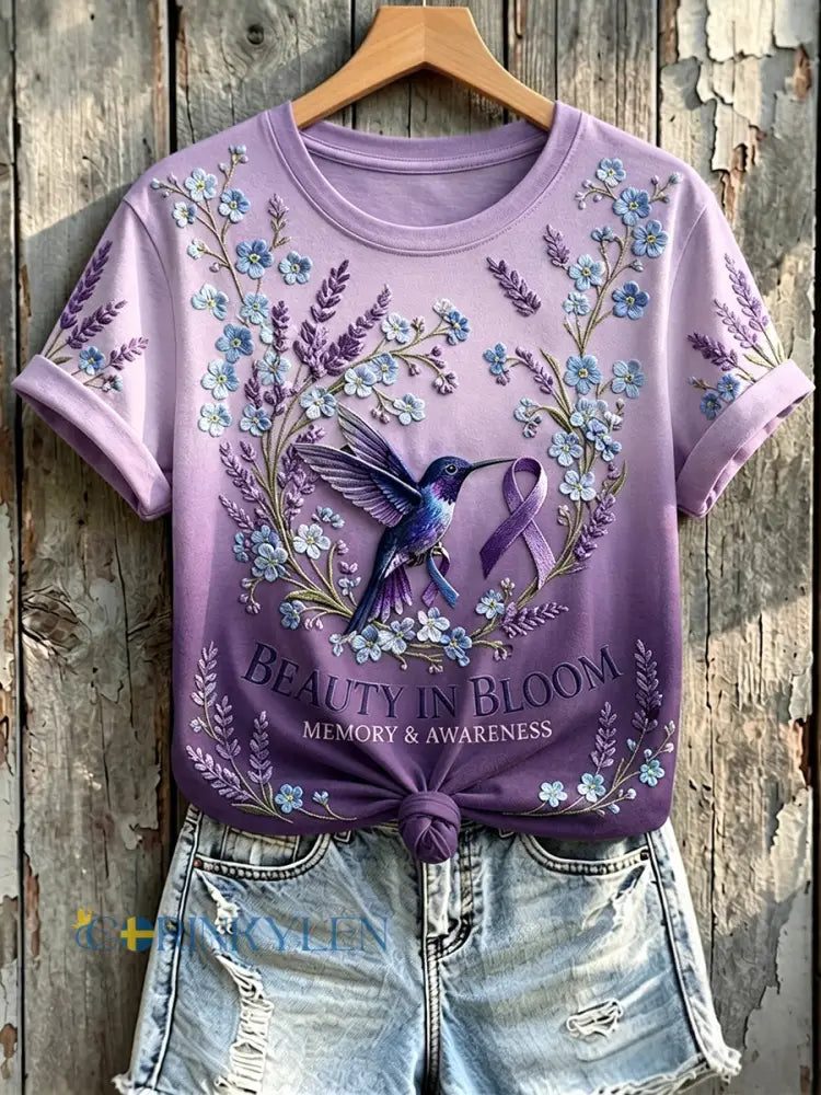 Kvinnlig minne- och medvetenhetsslanyra i lila med kolibriprydd kortärmad t-shirt - mörkt / S