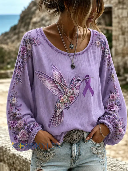 Kvinnors lila blommor & Hummingbird Skriv ut Alzheimers medvetenhet Stöd Långa ärmar Topp - mörk / S