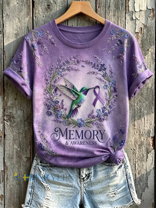 Kvinnors minne & medvetenhet Lilla Ribbon Hummingbird Print Short-T-shirt - mörkt / S