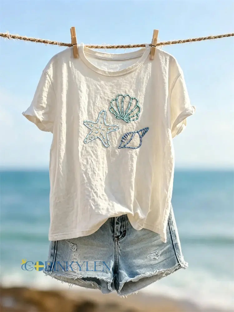 Kvinnors Starfish & Sea Shells Clean Art Skriv ut kortärmad T-shirt - bäie / S