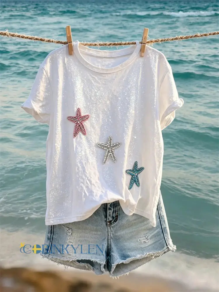 Kvinnsstjärna på Glitter Beach Art Skriv ut kortärmad T-shirt - vitt / S