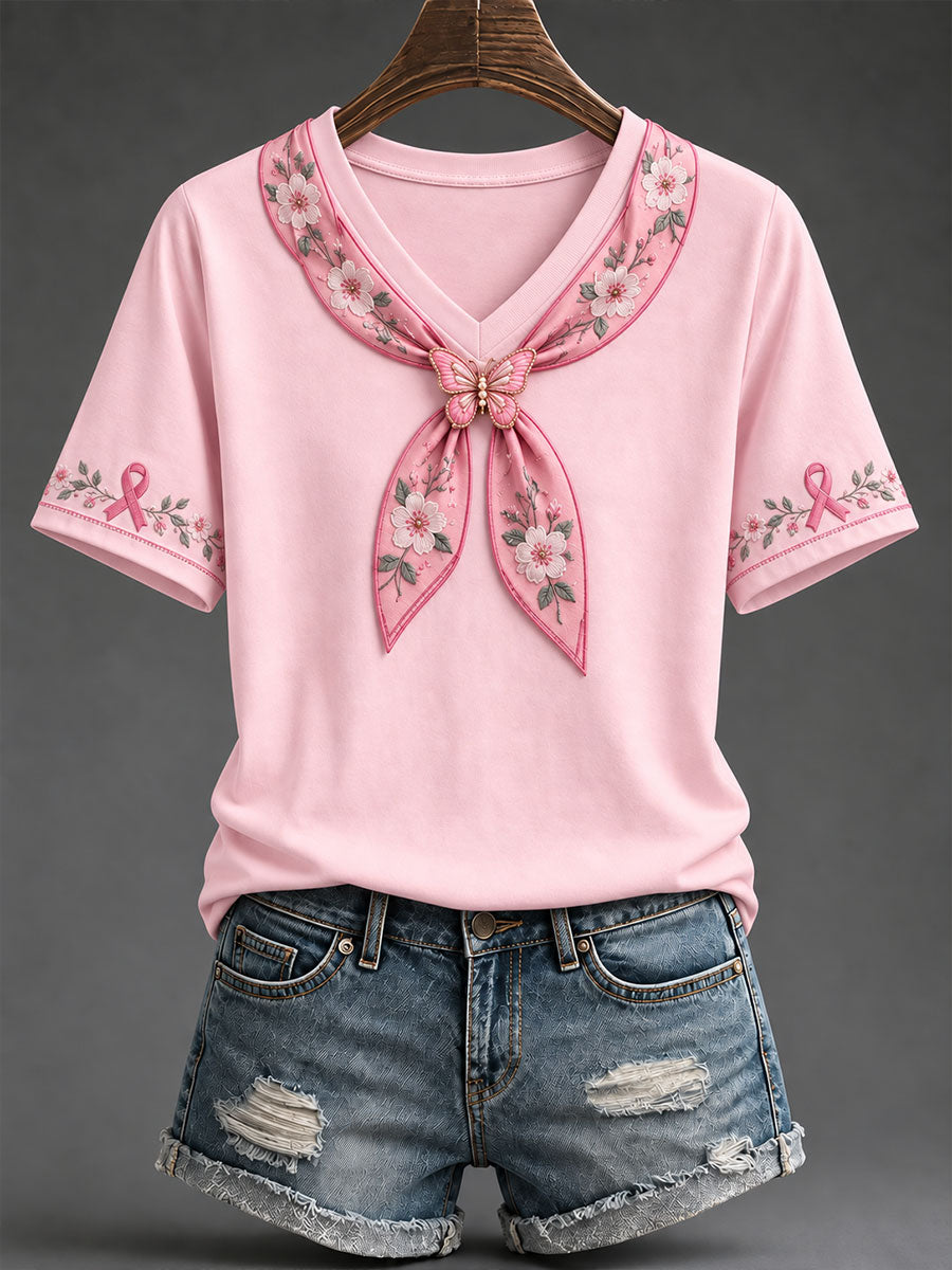 T-shirt för kvinnor med rosa rosett och blommigt konsttryck